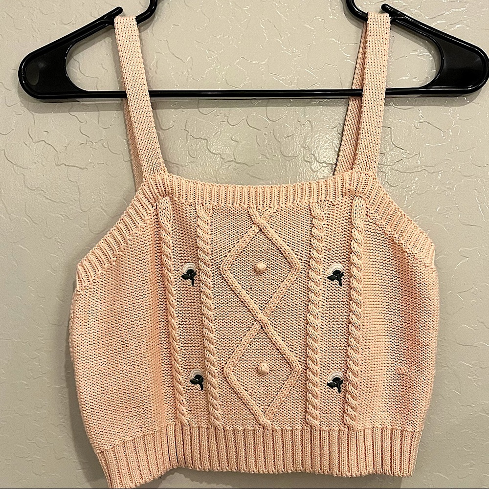 Peach-colored cropped sweater tank top